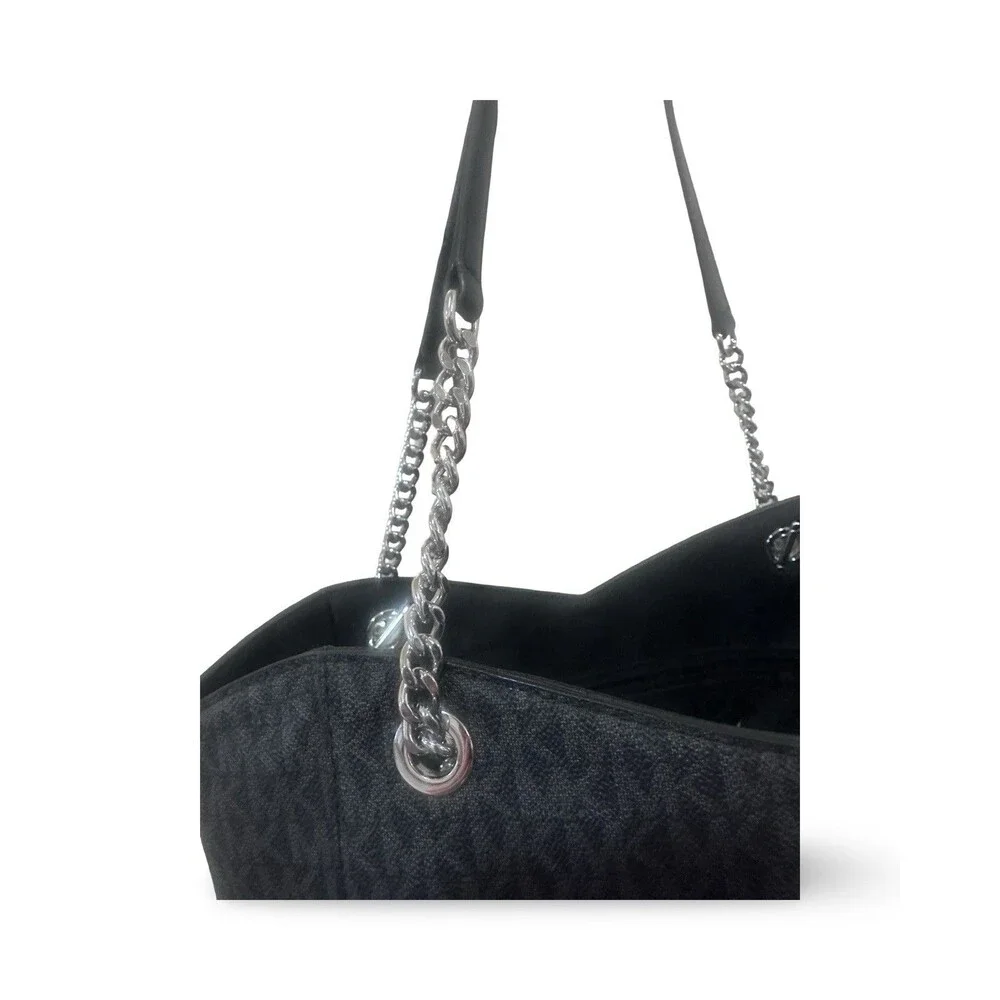 Michael Kors Jet Set Travel Large Chain Shoulder Tote in the color black.